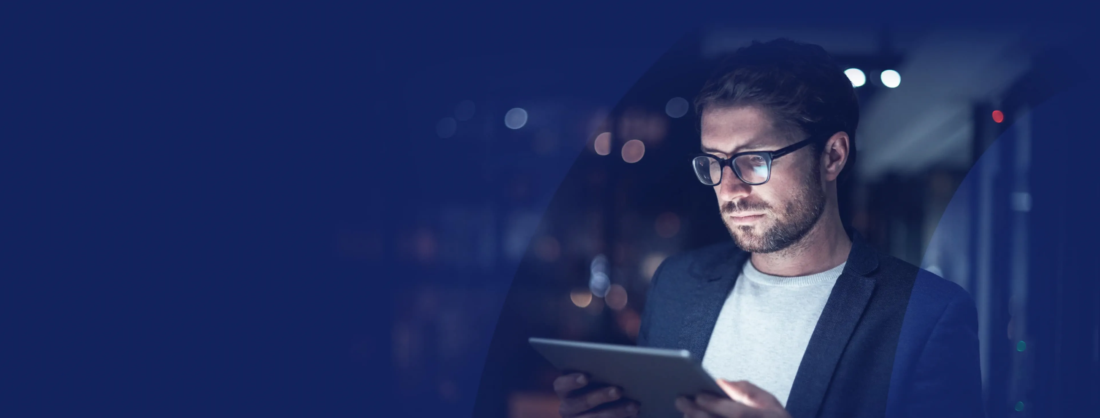 Trader looking at HGM GLOBAL app on a tablet